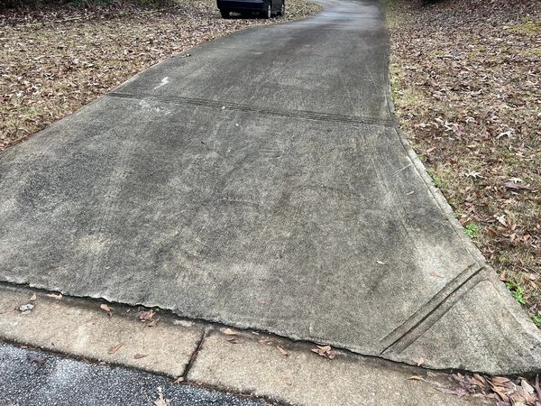 Concrete driveway before professional cleaning
