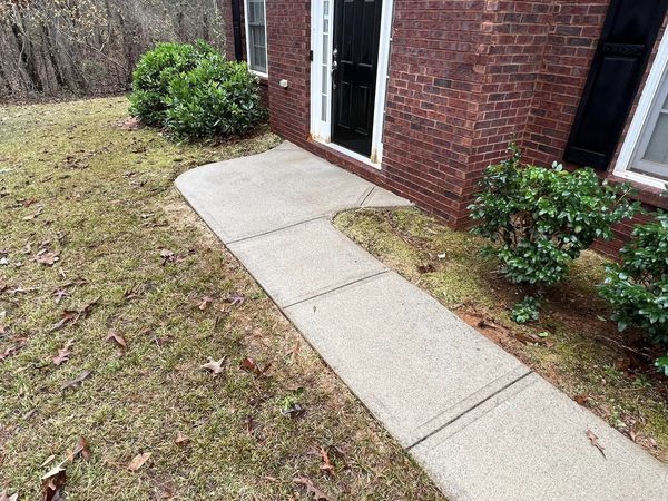 Front walkway after professional concrete cleaning